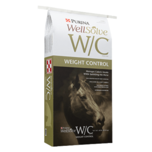 Purina WellSolve WC Horse Feed. Green and white 50-lb equine feed bag.